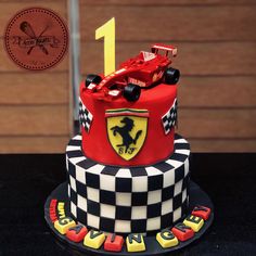 a birthday cake with a racing car on it