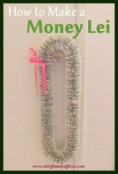 a money lei hanging on a door with the words how to make a money lei