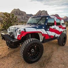 a jeep with an american flag painted on it