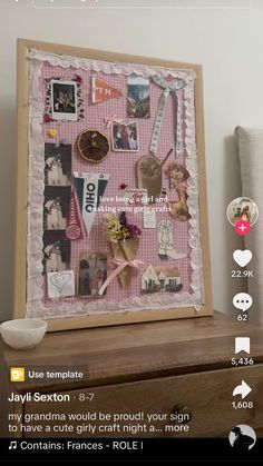 a wooden frame with pictures and flowers on it