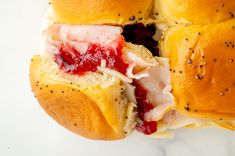 These Cranberry Turkey Sliders channel all of the fall vibes with warm bread, melty cheese, and bright cranberry sauce!