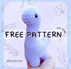 a hand holding a crocheted toy with the words free pattern below it