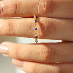 Lapis Lazuli Ring, the Cora ring is a beautiful and delicate combination of modern and unique line rings with a sense of sophistication. Stackable or not, it is an ideal ring to treat yourself to. Details: Center Gemstone: Lapis Lazuli Stone Shape: Round Measurements: 2.00mm (5) The Cora ring is also available in solid gold. Contact us for pricing. Planet Ring, Ring Inspo, Lapis Lazuli Jewelry, Moss Agate Ring, Blue Stone Ring, Lapis Lazuli Ring, Lapis Lazuli Stone, Rose Quartz Ring, Agate Ring