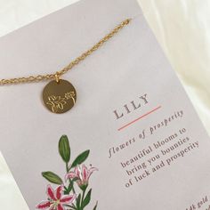 Lily, flower of prosperity. This beautiful 14k gold dipped necklace is perfect as a birthday present! 16-18in adjustable Lily Flower Necklace, Dainty Adjustable Jewelry For Gifts, Dainty Adjustable Jewelry As Gift, Dainty Adjustable Length Jewelry For Gifts, Adjustable 14k Gold Necklace Gift, Adjustable 14k Gold Necklace As A Gift, Gold Jewelry With Adjustable Length As Gift, Gift Adjustable Length Gold Jewelry, Gold Birth Flower Necklace Gift For Her