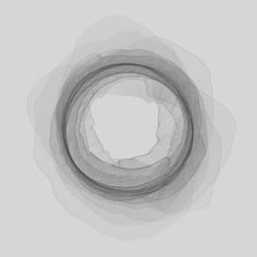 a circular object is shown in the middle of a gray background with white circles around it