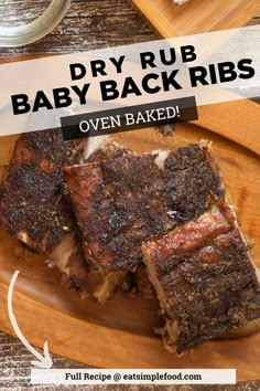 baby back ribs on a wooden plate with text overlay that reads dry rub baby back ribs oven baked