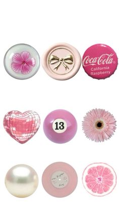 pink and white buttons are arranged in the shape of hearts, flowers, and other items