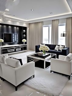 a living room filled with white furniture and lots of windows