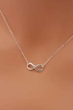 MADE WITH ALL SOLID STERLING SILVER PARTS - A GREAT KEEPSAKE This beautiful piece is made using solid sterling silver for a quality necklace. I use a sterling silver infinity charm set on a sterling silver chain. The necklace closes with a spring clasp. The infinity charm is the perfect size for a refined look. Comes in a gift box, perfect for gift-giving. **SIZING - PLEASE READ: Select your necklace size at checkout. Note that necklaces will fit differently depending on a person's size. Please Silver Infinity Necklace, Infinity Necklace Silver, Infinity Charm, Mini Charm, Infinity Necklace, Friend Necklaces, Summer Necklace, The Infinity, Necklace Size