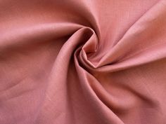 a close up view of a pink fabric