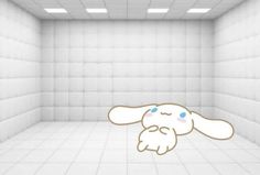 an empty room with a cartoon bunny in the middle and blue eyes on it's face