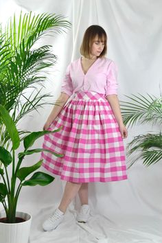 Magenta /cerise pink and white check high waist full gathered skirt. Perfect for casual outfits and special ocasions with pair of trainters or high heels. 100% cotton.  Elastic at the back of waist.  Two side pockets. Midi lenght about 70cm + 5 cm waistband. Handmade in UK.  Model wears size S.  HOW TO CHOOSE A SIZE ?   Using a measuring tape, measure the smallest part of your waist.  SIZE CHART: (CM) XS - W: 66 CM S - W: 70 CM M - W: 74 CM  L - W: 78 CM  XL - W: 82 CM  CARE INSTRUCTIONS: Hand w Summer Plaid Pleated Skirt, Pink Lined Skirt For Daywear, Pink Gathered Skirt Dress For Spring, Fitted Cotton Skirt For Picnic, Pink Spring Dress With Gathered Skirt, Relaxed Pink Skirt For Daywear, Spring Pink Dress With Gathered Skirt, Summer Tiered Skirt For Picnic, Pink Dress With Gathered Skirt For Spring