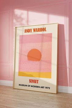 a pink and yellow poster with the words andy warhol sunset museum of modern art