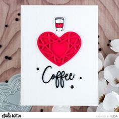 a card with a heart shaped cutout and coffee on it