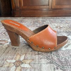 Bongo Stud Muffin Vintage Y2k Leather And Wooden Clogs Style: Stud Muffin Size: 8.5 New! Leather And Wood With Studded Detail On The Heels Heel Is Approx 4” 1970s Shoes, Ladies Heels, Wood Heels, Clogs Heels, Leather And Wood, Stud Muffin, Clogs Style, Wooden Clogs, England Style