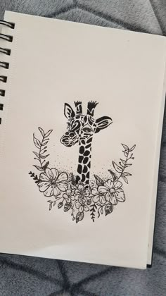 a drawing of a giraffe surrounded by flowers