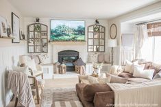 a living room filled with furniture and a fire place