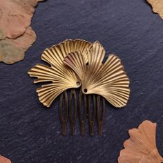 One of a kind, minimalistic bridal haircomb [1pcs] made of Gingko biloba leaf-shaped brass - copper elements and bronze color metal comb is really beautifull, hairpiece. Keep in mind that every piece will be a little different - in form or colors. Leaves are in different shades of brass gold with darker and copper or bronze color stains more like natural autumn leaves. This comb is cheaper than another one in my store because of defects and colors of the leaves. If you prefere comb with brass co Minimalist Bridal Hair, Gold Hairpiece, Wedding Hair Combs, Leaf Hair Piece, Gold Hair Piece, Gingko Biloba, Autumn Bridal, Bridal Hairpiece, Boho Wedding Hair