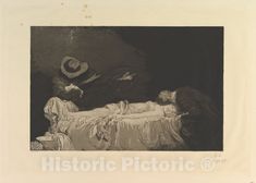 an old black and white photo of a woman laying in bed next to a man