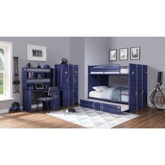 a bedroom with bunk beds and blue cabinets