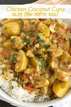 chicken coconut curry with rice in a white bowl