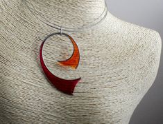 Red orange jewelry set. Art necklace and earrings set made of stainless steel, red and orange epoxy resin. ABOUT ME My name is Nikolin Georgiev and I live in Sofia, Bulgaria. I love creating beauty therefore I make jewelry. I love colours and stones' emanation. I also love the soft warmth of wood as well as the glitter of the buffalo horn. I like natural materials and I enjoy combining them. I use whatever Mother Nature had given us and let the material lead me until I reach the completeness of Unique Orange Nickel-free Jewelry, Modern Resin Jewelry For Gifts, Modern Resin Jewelry Gift, Nickel-free Red Resin Jewelry, Modern Orange Necklace As Gift, Modern Orange Necklace For Gift, Elegant Orange Resin Jewelry, Orange Resin Jewelry For Gift, Modern Red Necklace For Gift