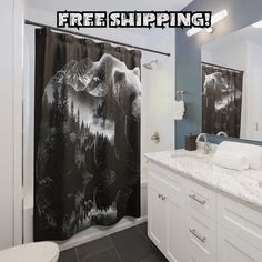 a black and white shower curtain with the words free shipping on it in front of a bathroom sink