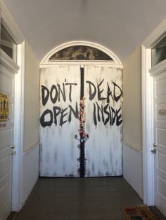 an open door with the words don't dead open inside painted on to it