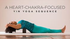 a woman is doing yoga in front of a sign that says, a heart - chakra - focused yin yoga sequence