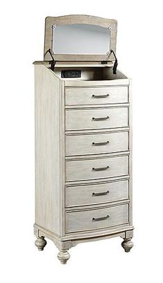 a white dresser with a mirror on top of it's drawer and drawers underneath