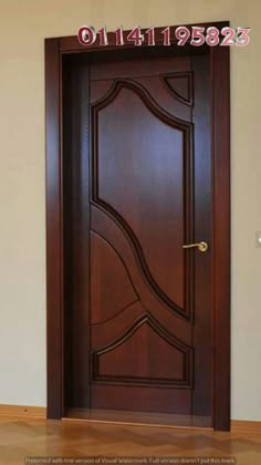 a wooden door in the middle of a room