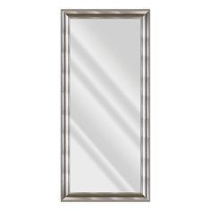 a silver framed mirror on a white wall