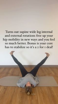 a woman is laying on her back in a yoga pose with the words, turns out supine wide leg international and external rottations free up your hip mobility