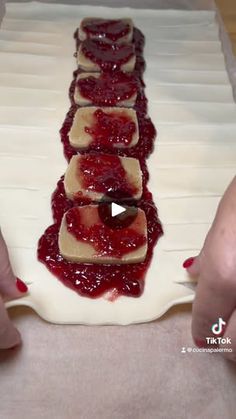 someone is making some kind of dessert with jelly