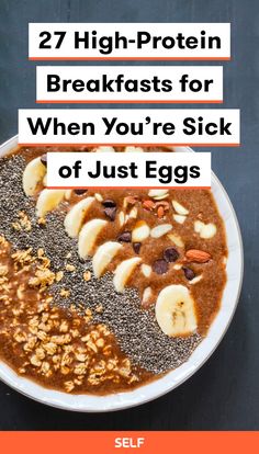 a bowl filled with cereal and nuts on top of a black table next to an orange border