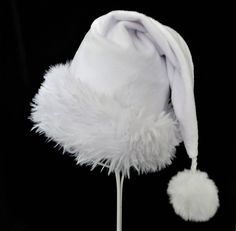 "White as snow and classic Santa styling in velvety soft minky polyester fabric slouch style stocking Santa hat. There is a soft and fluffy white faux fur fabric turn up brim for the trim and a white faux fur pompom dangle.  Proportions of the hat are generous and will fit most head sizes, ladies or gents.  Measurement for opening for your head is 24-25\" circumference and the length is 20\". Check measurements to make sure this size will work for you.   Custom orders for larger and smaller head White Mini Hats For Winter Party, White Christmas Cap, 30th Outfit, Santa Claus Costume, 30 Outfits, Christmas Clothes, Cowboy Christmas, Fur Fabric, Christmas Celebration