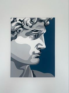 a painting of a man's face in grey and blue tones on a white wall