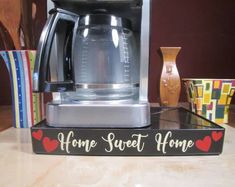 a coffee maker sitting on top of a counter