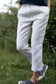 "Striped linen cropped pants. -------------------------------------------------------------------------------------------------------- DESCRIPTION: -Silhouette- - pleated detail at the front - zipper and button closure - side seam pockets - slim cropped legs - handmade by our family -FABRIC&CARE Available in any other color of listed linen. We use medium weight and 100 % Oeko-Tex certified linen, which means that it meets ecological requirements. Hand wash or gently machine washable 30oC, ha Linin Pants, Women Linen Pants, Pants Linen, Cropped Linen Pants, Linen Crops, Classic Women, Summer Linen, Wide Leg Linen Pants, Check Dress