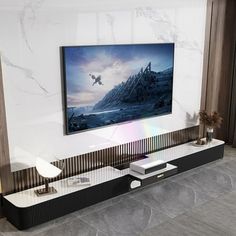 a flat screen tv mounted to the side of a wall