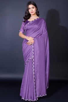 Elevate your elegance with this Designer Khadi Shimmer Saree, a perfect blend of traditional charm and modern allure. Crafted from luxurious Khadi Shimmer fabric, this saree features exquisite border work that gracefully frames the drape, adding a touch of sophistication to every pleat. The matching blouse, also in Khadi Shimmer, complements the saree for a seamless, radiant look. Slight color variations may occur due to digital imaging. Accessories shown are for styling purposes only and not in Shimmer Saree, Sequins Saree, Fancy Fabric, Party Wear Lehenga Choli, Readymade Saree, Gorgeous Blouses