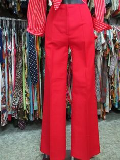 "Stunning oroginal 70s red flared pants/trousers/Deadstock/The hem is to be sewn depending on desired fit. Mint conditions. They fit medium size, about 8 US Check the rise in order to detrmine the waistline Measurements: Waist 27.5\" hips 38.58\" rise 10.23\" inseam 34.6\" bottom width 11.8\" X 2 Bellissimi pantaloni rossi a zampa di elefante anni 70. Fondo di magazzino. Orlo ancora da fare su misura. Gabardina. Ottime condizioni. Vestono circa una taglia 44 Misure: Vita 70 cm fianchi 98 cm cava Vintage Red Wide Leg Pants, Vintage Red Straight Leg Pants, Retro Fitted Red Pants, Vintage Red Full-length Pants, Vintage Red Full Length Pants, Fitted Flare Pants 1970s Style, Vintage Red High-waisted Pants, Retro Red Bottoms For Workwear, 1970s Flare Fitted Pants