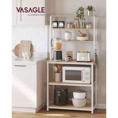 a white microwave oven sitting on top of a wooden shelf next to a kitchen counter