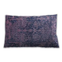 a purple and black pillow on a white background