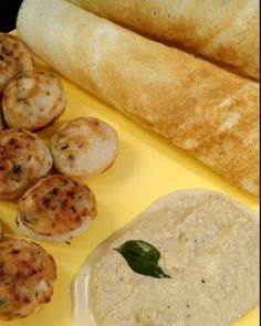 some food is laying out on a yellow plate