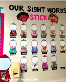 a bulletin board that has some pictures on it with the words, our sight words and stickers