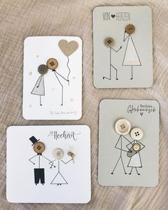 three cards with buttons on them that say i love you and two people holding hands