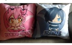 two pillows that have anime characters on them