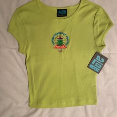 Brand New With Tags! Perfect Condition, Never Worn Before Super Cute Just Not My Style Green Y2k Graphic Print Tops, Y2k Green Graphic Print Tops, Retro Fitted Green T-shirt, Green Graphic Print Y2k Tops, Yellow Fitted Crew Neck Top, Green Y2k Summer Tops, Green Y2k Style Summer Top, Green Summer Y2k Tops, Casual Fitted Lime Green Top