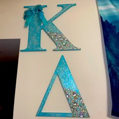 the letter k is made out of glitter